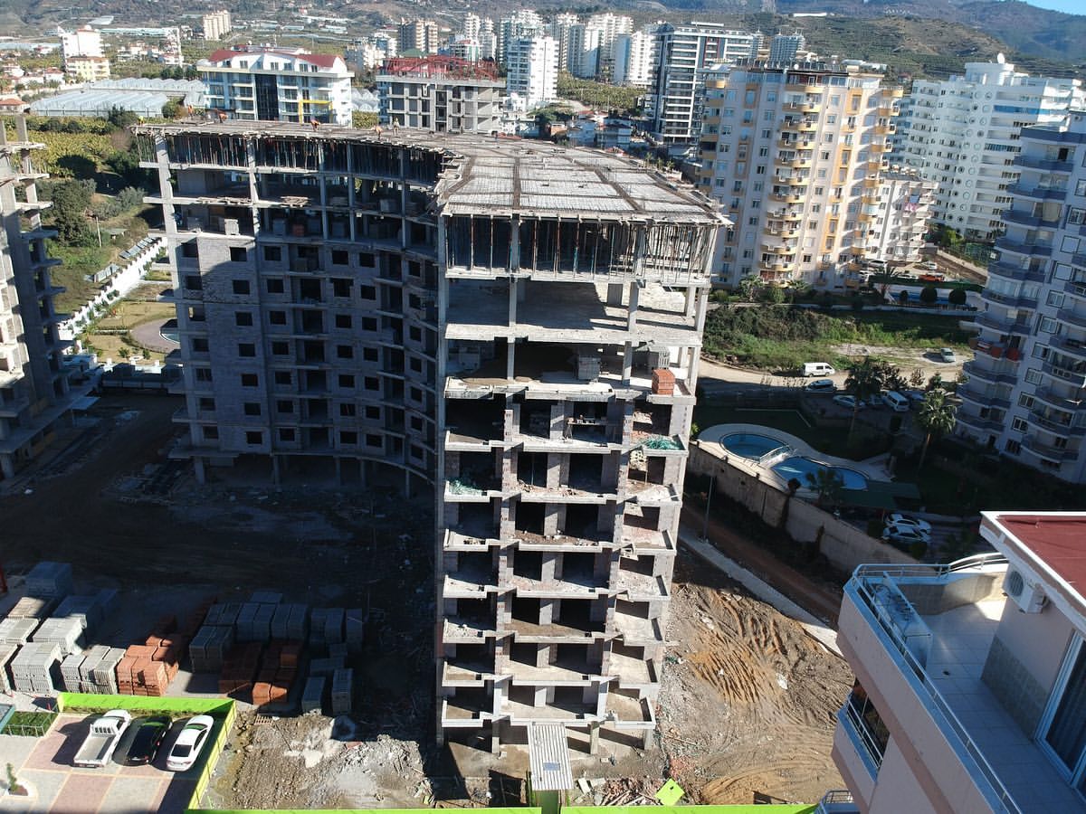 Новые квартиры в Махмутлар на этапе стройки