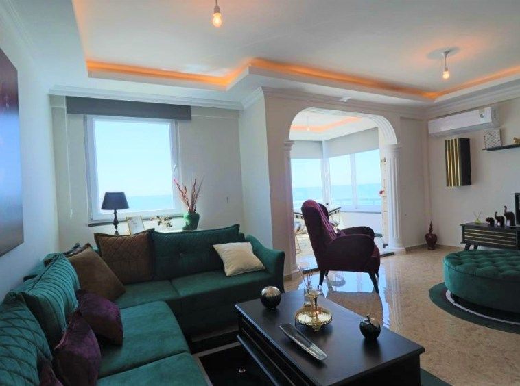 Меблированная квартира 2+1 с видом на море в Махмутлар