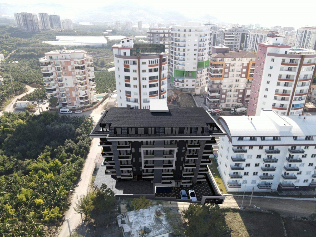 Новые квартиры 1+1 в новом комплексе район Махмутлар