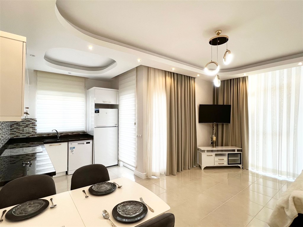 Квартира 1+1 с мебелью в районе Махмутлар - Турция
