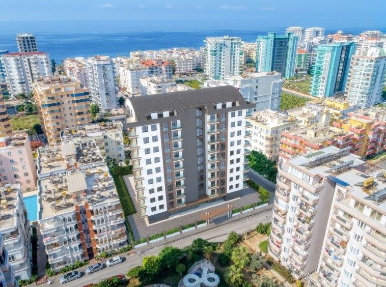 Новые апартаменты рядом с пляжем в Махмутларе