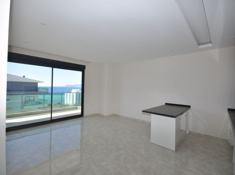 Новая квартира 1+1 с видом на море в Каргыджаке - Алания