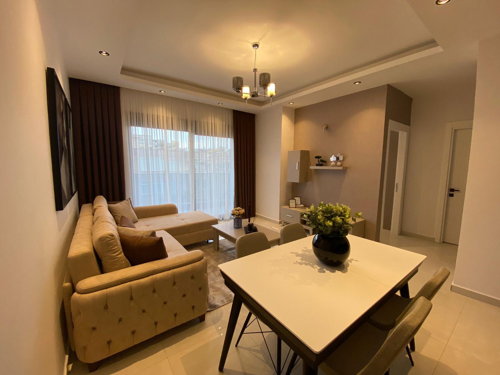 Меблированные апартаменты 1+1 в Махмутлар - Алания