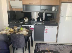 Квартира 1+1 в Махмутларе: собственный пляж