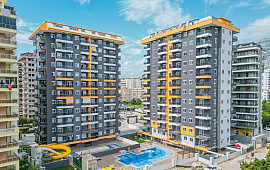 Новые апартаменты 2+1 в центре района Махмутлар